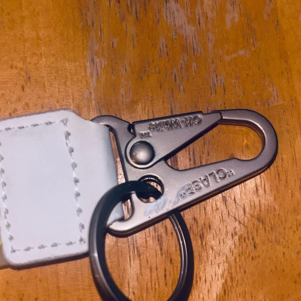 Off-White Keychain with Yellow Lettering - Picture 2 of 3
